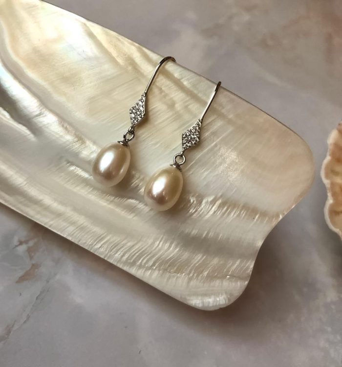 Parel oorbellen met diamantjes